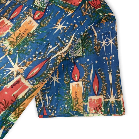 Candle flames on Christmas Eve