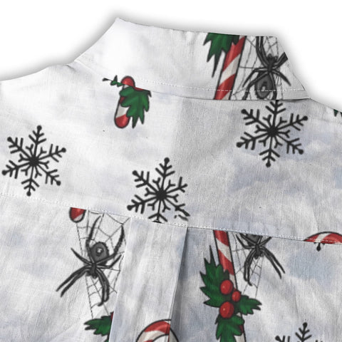 Spider's Christmas candy cane on a snowy night