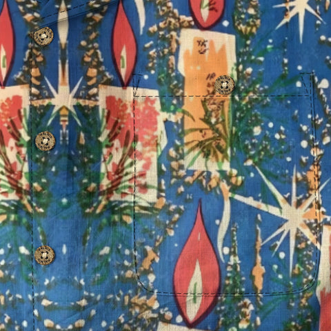 Candle flames on Christmas Eve